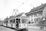 Tw 75 mit Bw 160 kreuzt mit einem weiteren Straßenbahnzug auf der Linie 8 (Bahnhofstraße – Rohrbacher Straße – Rohrbach – Leimen – Nußloch – Wiesloch) in Heidelberg. (20.05.1956) <i>Foto: Helmut Röth *</i>