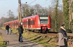 Zu Zeiten von DB-Regio verkehrte die RB 48 mit zwei Garnituren der Baureihe 425. Am 30. Januar 2011 waren 425 099 und 425 607 als RB 11123 (Wuppertal - Köln) bei Solingen-Ohligs unterwegs. (30.01.2011) <i>Foto: Joachim Bügel</i>