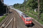 181 211 fährt mit dem Freitags-PbZ 2470 nach Dortmund durch Wuppertal-Oberbarmen. (29.06.2018) <i>Foto: Wolfgang Bügel</i>