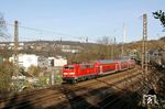 111 127 mit RE 10422 nach Aachen vor der Kulisse der Bayerwerke in Wuppertal-Sonnborn. (15.02.2020) <i>Foto: Wolfgang Bügel</i>