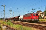140 672 (Bh Mannheim) fährt mit einem Güterzug aus Leipzig-Schönefeld. (05.07.2006) <i>Foto: Thomas Konz</i>