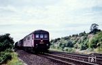 Die ehemalige Wehrmachtslok D 311.04 a/b, seit 1951 als V 188 002 a/b unterwegs, mit einem Güterzug auf der Nord-Süd-Strecke am Distelrasen bei Schlüchtern.  (30.07.1960) <i>Foto: Karl-Ernst Maedel</i>