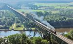 012 104 mit DPE 74200 nach Westerland (Sylt) auf der Hochdonner Brücke über den Nord-Ostsee-Kanal.  (20.07.2024) <i>Foto: Joachim Schmidt</i>