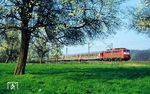 Vor dem dreigleisigen Ausbau des Streckenabschnitts zwischen Leverkusen und Langenfeld ist die Stuttgarter 110 180 mit einem Sonderzug nach Rom bei Leverkusen-Rheindorf unterwegs. (30.03.1990) <i>Foto: Wolfgang Bügel</i>