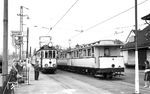 Im Bahnhof Weinheim OEG kreuzen Tw 3 mit Bw 123 und 102 und Tw 7 mit Bw 132 und 120. (15.07.1959) <i>Foto: Aad van Ooy</i>