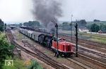 211 211 (Bw Kornwestheim) leistet der Tübinger 038 039 Vorspann vor einem Nahverkehrszug in Eutingen. (08.1971) <i>Foto: Robin Fell</i>