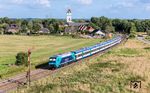 245 201 schiebt den RE 11016 nach Hamburg-Altona durch Lindholm. (04.08.2024) <i>Foto: Joachim Schmidt</i>