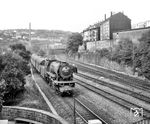 23 043 vom Bw Mönchen Gladbach mit N 3694 (Hagen - M Gladbach) in Wuppertal Zoologischer Garten. (19.07.1959) <i>Foto: John Benson, Williams Hill collection</i>