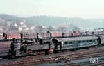 94 1211 rangiert den AB4ü-Wagen "11480 Reg" in Passau.  (18.03.1955) <i>Foto: Carl Bellingrodt</i>