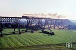 Der Blick von einem Silo am Nord-Ostsee-Kanal bescherte eine neue Perpektive auf die Hochdonner Brücke und auf 012 104, die mit dem Saisonschnellzug D 1323 nach Hamburg-Altona den Weg über die 2.218 m lange Brücke nimmt. (20.07.1972) <i>Foto: Herbert Vaupel</i>