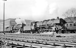 Mit vereinten Kräften starten die Rheiner 03 064 und 01 009 mit dem E 731 (Wuppertal-Vohwinkel - Norddeich) in Münster (Westf) Hbf. (06.04.1963) <i>Foto: Bernd Kappel</i>