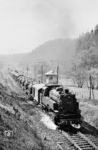 82 020 vom Bw Koblenz-Mosel verlässt mit einem Güterzug nach Siershahn den Bahnhof Grenzau. Am Zugschluss hilft 82 021 als Schiebelok tatkräftig mit (vgl. Bild-Nr. 102538). (10.04.1968) <i>Foto: Jürgen Munzar</i>