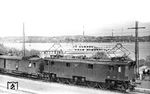 E 16 21 (Bw München Hbf) mit einem Personenzug nach Kochel im Bahnhof Starnberg. Im Hintergrund legt gerade das Fahrgastschiff "Bayern" (Baujahr 1939) am Anleger an. (12.05.1957) <i>Foto: Carl Bellingrodt</i>