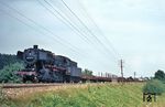 052 844 (Bw Ulm) mit einem südwärts fahrenden Güterzug auf der Württembergischen Südbahn bei Aulendorf. (12.08.1969) <i>Foto: Helmut Dahlhaus</i>