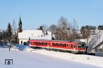 628 103 als RB 5529 nach Füssen in Oberzollhaus vor der Kirche St. Magnus. (30.12.2005) <i>Foto: Stefan von Lossow</i>