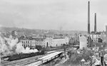 Ruinen und ausgebrannte Fensterhöhlen prägten das Bild von Carl Bellingrodts Heimatstadt vier Jahre nach Kriegsende. 74 913 vom Bw Wuppertal-Steinbeck fährt mit N 055 nach Gevelsberg Nord aus dem Bahnhof Wuppertal-Barmen. Mit den Kurzpersonenzügen zwischen Vohwinkel und Gevelsberg wurde bereits kurz nach dem Krieg ein S-Bahnähnlicher Verkehr auf der Wuppertaler Ost-Westachse aufgezogen. (23.03.1949) <i>Foto: Carl Bellingrodt</i>