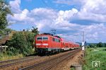 111 202 mit einem RE nach Nürnberg bei Pölling. (25.07.2009) <i>Foto: Thomas Konz</i>