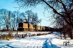 110 275 (Bw Pasewalk) mit einem Personenzug aus Eberswalde an der Blockstelle Kerkow nördlich von Angermünde. (02.1979) <i>Foto: Karsten Risch</i>