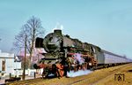 012 104 befördert den E 1774 (Westerland/Sylt - Hamburg-Altona) in Elmshorn. (07.04.1969) <i>Foto: Robin Fell</i>