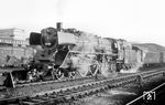 03 197 vom Bw Rheine (mit 2'2 T30-Kurztender) ist mit E 734 aus Emden in Münster (Westf) Hbf angekommen. (12.05.1964) <i>Foto: Bernd Kappel</i>
