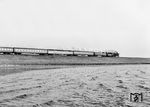 012 084 dampft mit dem E 1776 nach Hamburg-Altona über den Hindenburgdamm dem Festland entgegen. (06.04.1969) <i>Foto: Jörg Schulze</i>