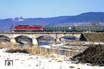 Eine unerkannt gebliebene 132 des Bw Meiningen fährt mit P 7020 nach Eisenach über die Werrabrücke in Wasungen. (24.02.1991) <i>Foto: Wolfgang Bügel</i>