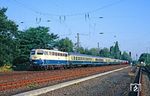 110 432 vom Bw Dortmund 1 mit dem über die Güterzugstrecke umgeleiteten EC 40 "Moliere" (Dortmund - Köln - Aachen - Paris Nord) in Immigrath. (04.08.1990) <i>Foto: Joachim Bügel</i>