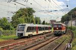 648 006 der RheinRuhrBahn trifft in Wuppertal-Elberfeld auf einen Bauzug mit 232 088 der Salzland Rail Service. (27.08.2025) <i>Foto: Wolfgang Bügel</i>