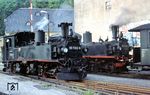 In Niederschmiedeberg begegnen einander 99 1594 mit P 14294 nach Wolkenstein und die dort rangierende 99 1582. (23.05.1974) <i>Foto: Bernd Kappel</i>