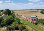 Nach Lübeck ist 218 409 mit dem RE 56858 in Grieben (Meckl) unterwegs. (08.09.2025) <i>Foto: Joachim Schmidt</i>