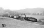 50 3539 als Leihlok des Bw Nossen für das Bw Karl-Marx-Stadt, Est Aue, mit Dg 54313 nach Aue (Sachs) hinter Wilkau-Haßlau. Warum die Lok an diesem Tag unüblicherweise mit Tender voraus angefahren kam, ist nicht bekannt. (24.03.1984) <i>Foto: Thomas Fischer</i>