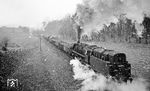 Der Umleitergüterzug mit 44 0397 und Schiebelok 44 0221 kurz vor Singen.  (04.1977) <i>Foto: Burkhard Wollny</i>
