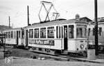 Einsatzwagen Tw 523 (Baureihe H, Westwaggon Mainz, Baujahr 1942) im Betriebsbahnhof Frankfurt-Heddersheim. Der 1958 durch die Ausrüstung mit stärkeren Motoren der Baureihe K zur Baureihe HK gewordene Triebwagen wurde 1964 für den Einsatz auf den Vorortstrecken zur Baureihe Hv umgerüstet. Die Fahrzeuge erhielten dafür Doppelscheinwerfer und breitere Radreifen.  (02.1964) <i>Foto: Gerhard Karl</i>