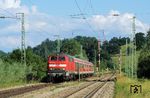 218 166 fährt mit RE 30642 in Huglfing ein. (01.07.2006) <i>Foto: Stefan von Lossow</i>