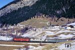 ÖBB 110.017 leistet der Münchener 111 108 Vorspann vor dem Ex 281 "Alpen-Express" (München - Kufstein - Innsbruck - Brennero/Brenner - Verona - Roma Termini) auf der Brennerbahn bei St. Jodok. (17.02.1988) <i>Foto: Joachim Bügel</i>
