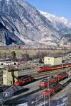 ÖBB 1044.088 fährt mit EC 62 "Transalpin" (Wien - Zürich) aus dem Bahnhof Landeck. In der Zugförderstelle warten u.a. 1020.038, 1020.032 und 1110.502. (17.02.1988) <i>Foto: Joachim Bügel</i>