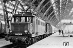244 134, ein Reparationsrückkehrer aus der Sowjetunion, vor P 8605 in Leipzig Hbf. Die ehemalige Weißenfelser Lok war im April 1946 in die UdSSR verfrachtet worden und kehrte von dort im Juli 1952 zurück. Nach einer Grundüberholung konnte sie im Januar 1956 in Halle (Saale) wieder in Betrieb genommen werden. (22.12.1983) <i>Foto: Thomas Fischer</i>