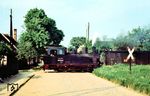 99 4644 mit einem Personenzug nach Burg in Grabow. (08.1965) <i>Foto: Klaus Kieper, Slg. Holzborn</i>