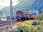 Anlässlich des 100-jährigen Jubiläums der Gotthardbahn waren die SBB-Museumsloks Be 4/6 12320, Ce 6/8 14253 ("Krokodil") und RAe 2/4 1002 ("Roter Pfeil") bei Wassen unterwegs. (15.09.1981) <i>Foto: Karsten Risch</i>