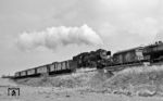 023 006 begegnet mit P 3712 bei Maulach einem Güterzug. (27.03.1971) <i>Foto: Burkhard Wollny</i>