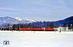 ÖBB 1245.004 mit 1020.012 und 1044.085 vor einem Güterzug auf der Giselabahn bei St. Johann in Tirol. (23.02.1988) <i>Foto: Joachim Bügel</i>
