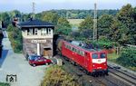 140 756 (Bw Köln-Deutzerfeld) passiert den Abzweig Tiefenbroich bei Ratingen. Hier zweigt die Angertalbahn von der Duisburg-Wedauer Güterzugstrecke ab. (20.10.1990) <i>Foto: Joachim Bügel</i>