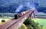 044 184 (ex 44 1184 vom Bw Ehrang) rollt mit einem Güterzug über die Moselbrücke zwischen dem Petersberg Tunnel und dem Bahnhof Ediger-Eller. (23.07.1971) <i>Foto: Robin Fell</i>