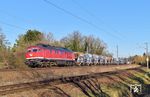 232 535 der Wedler Franz Logistik Potsdam mit einem Schotterzug von Dresden anch Lüptitz zwischen Borsdorf und Engelsdorf östlich von Leipzig. (05.03.2026) <i>Foto: Ralf Opalka</i>