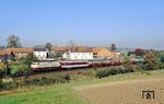 103 227 führt den EC 75 "Tiziano" (Hamburg-Altona - Frankfurt/M - Basel SBB - Gotthard - Milano C) im Haunetal bei Neukirchen. (23.10.1990) <i>Foto: Wolfgang Bügel</i>