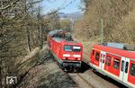 114 007 begegnet mit Lr 73528 (Limburg - Frankfurt Hbf) einer S 2 bei Eppstein (Ts). (19.03.2026) <i>Foto: Marvin Christ</i>