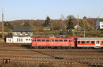Die am 22.09.1966 in Dienst gestellte 110 429 befördert in ihrem 45. Einsatzjahr die Regionalbahn RB 30524 (Düsseldorf - Emmerich) durch Düsseldorf-Rath. Zwei Monate nach dieser Aufnahme (12.05.2012) wurde sie wegen Fristablauf abgestellt und am 03.08.2012 verschrottet. (23.03.2012) <i>Foto: Joachim Bügel</i>