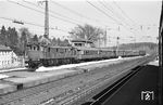 116 007 (Bw Freilassing) fährt mit P 1810 aus Freilassing in den Bahnhof Traunstein ein. (02.1968) <i>Foto: Jürgen Hagemann</i>