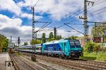 245 213 wechselt im Bahnhof Elmshorn mit RE 11012 nach Westerland (Sylt) von der Bahnstrecke Hamburg-Altona–Kiel auf die Marschbahn. (04.05.2026) <i>Foto: Thorsten Eichhorn</i>