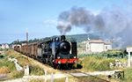 CP 296 (Henschel, Baujahr 1924) mit einem Güterzug auf der 'Linha do Douro' bei Sao Martinho do Campo nordöstlich von Porto. (30.08.1971) <i>Foto: Robin Fell</i>